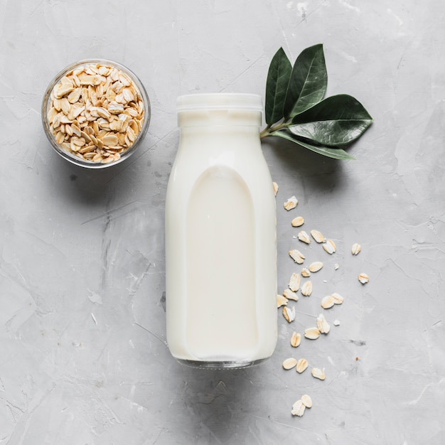 Top view milk bottle with oatmeal