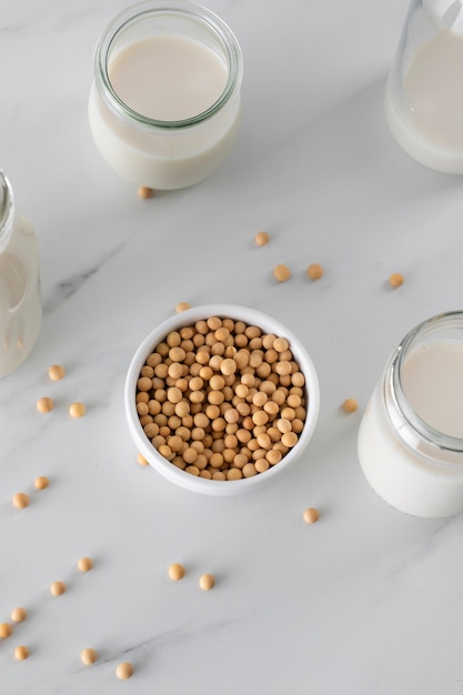 Free photo top view milk day concept with chickpeas