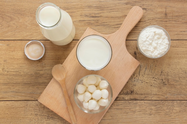 Top view milk on wooden background