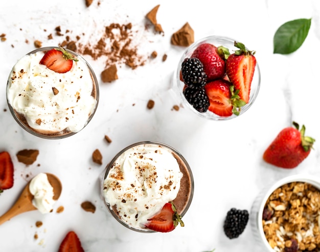 Top view milkshakes with fruits