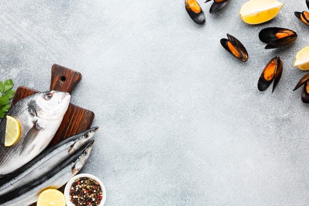 Top view mix of fresh seafood on table