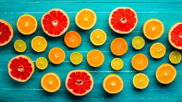 Top view mixed citrusses on table