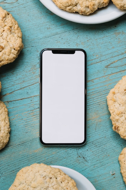 Free photo top view mobile phone template