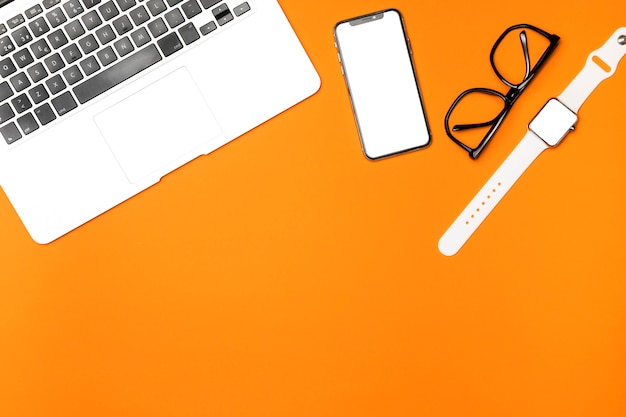 Top view mockup devices with orange background