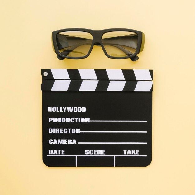 Top view movie clapperboard with 3d glasses