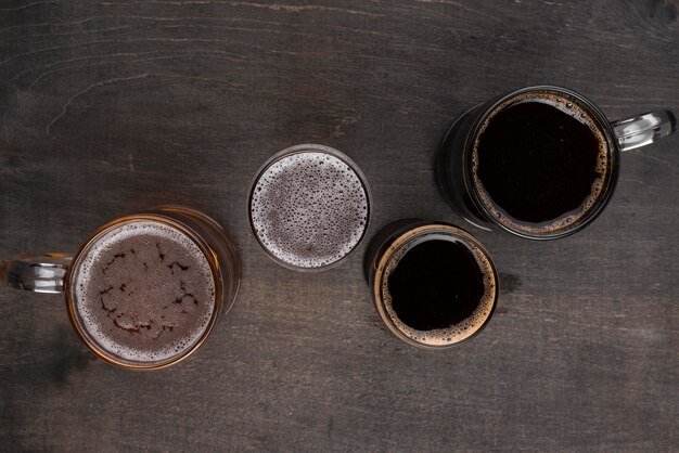 Top view mugs and beer glasses