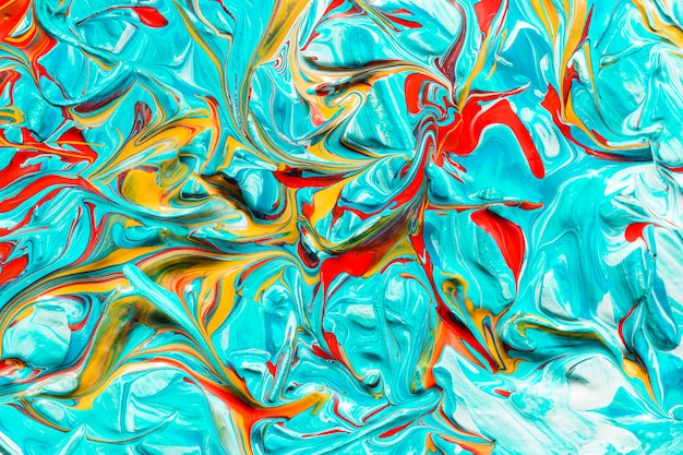 Top view of multi chromatic paint brush strokes on surface