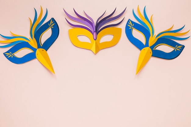 Free photo top view of multicolored masks for carnival