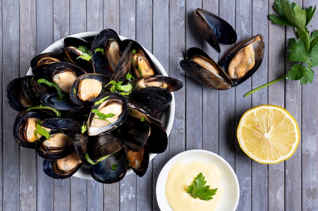 Top view mussel shells with dip