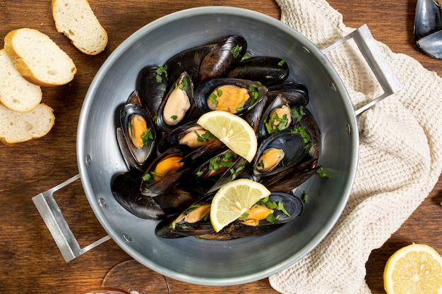 Top view mussel shells with lemon