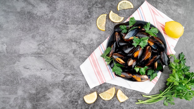 Top view mussels and herbs