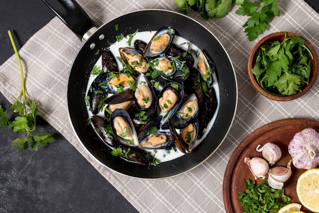 Top view mussels with parsley and garlic