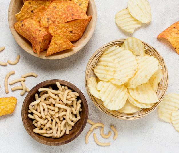 Top view of nacho chips and potato chips