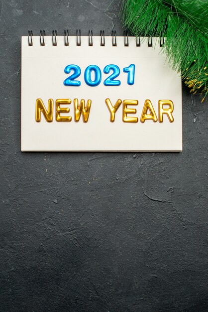 Top view new year note with writing in notepad