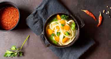 Free photo top view noodle soup for winter meals