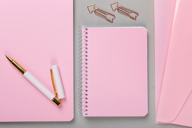 Top view notebook and pencil arrangement