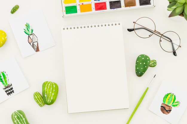 Top view notebook with cactus