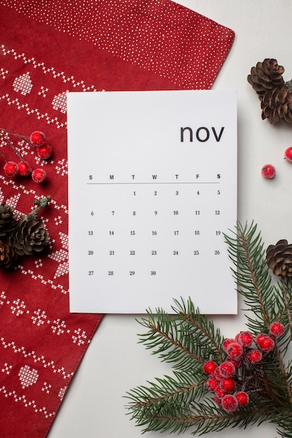 Бесплатное фото Вид сверху ноябрьский календарь и филиалы