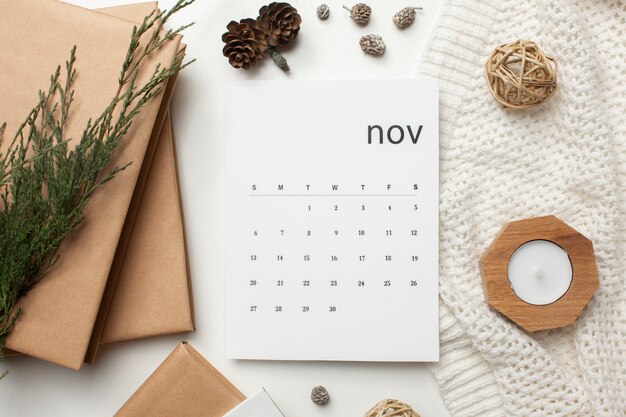 Top view november calendar and branches