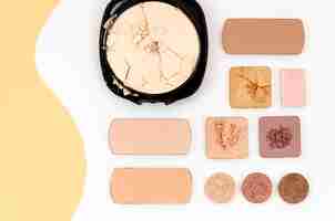 Free photo top view nude cosmetics on white background