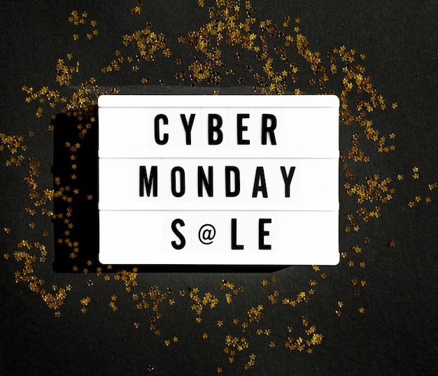 Бесплатное фото Вид сверху светового короба cyber monday с золотым блеском