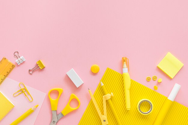 Top view of office stationery with compass and eraser