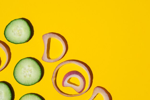 Top view onion rings and cucumbers