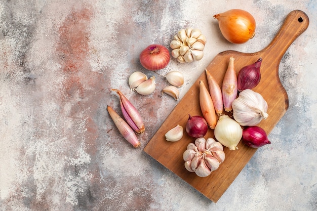 Top view onions and garlics fresh ingredients