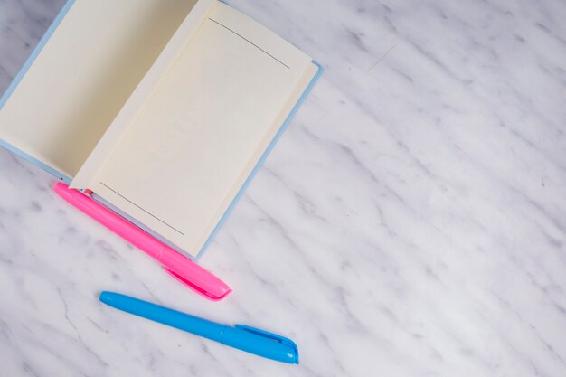 Top view of open book on table