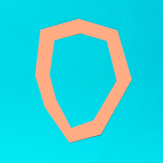 Free photo top view orange geometric shape