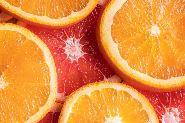 Вид сверху дольками апельсина и грейпфрута