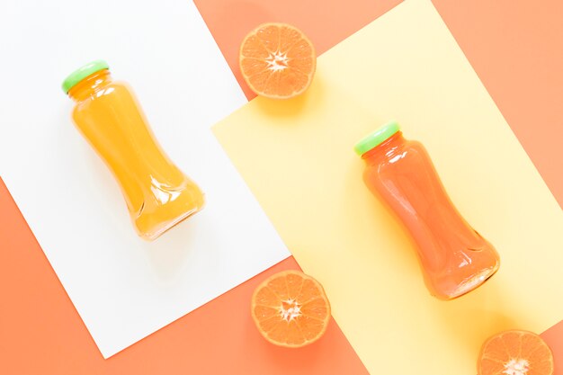 Free photo top view orange and grapefruit smoothie