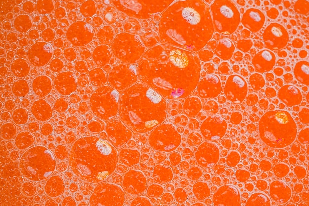 Top view orange liquid background