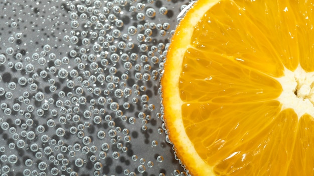 Top view orange slice and sparkling water