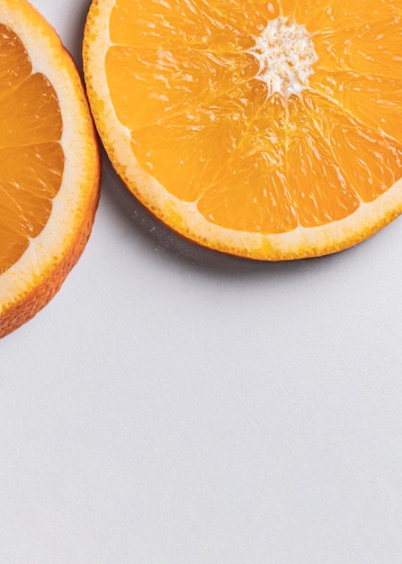 Free photo top view orange slices with copy space