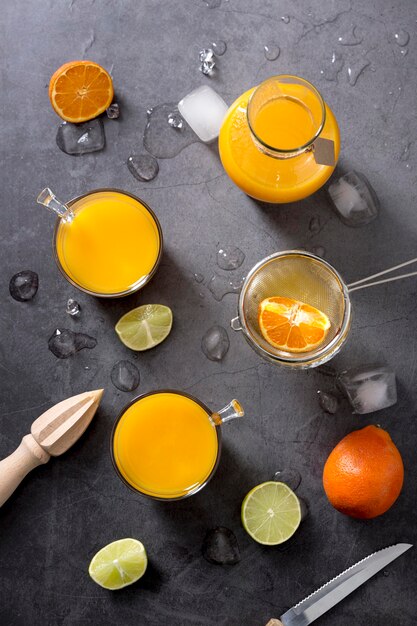 Top view orange smoothie on table