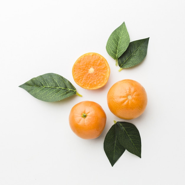 Top view of orange with leaves concept