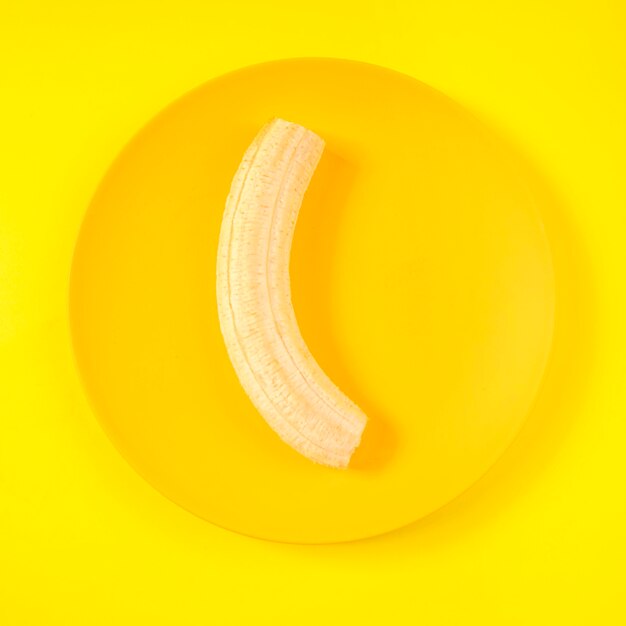 Top view organic banana on a plate