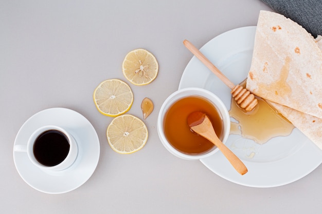 Top view organic honey with tortillas