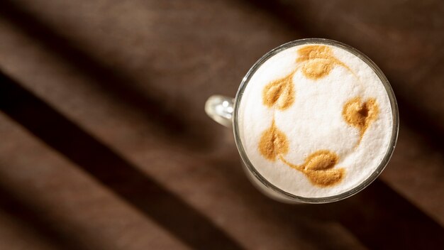 Top view organic latte macchiato with milk