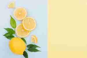 Free photo top view organic lemon with copy space