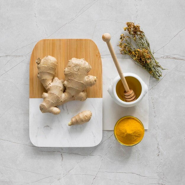 Top view of organic medicines with ginger