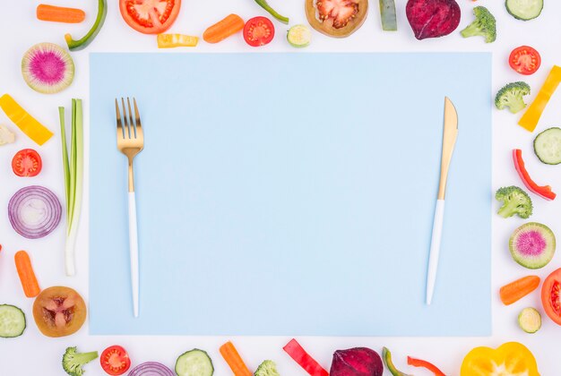 Top view organic vegetables with cutlery