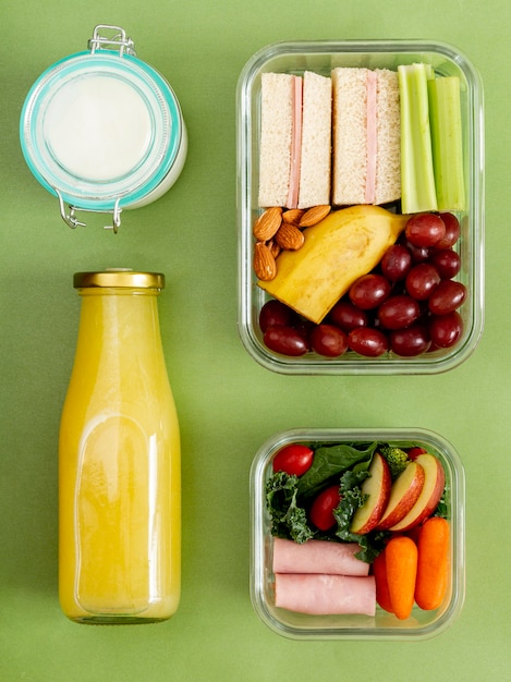 Top view packed food and juice bottle