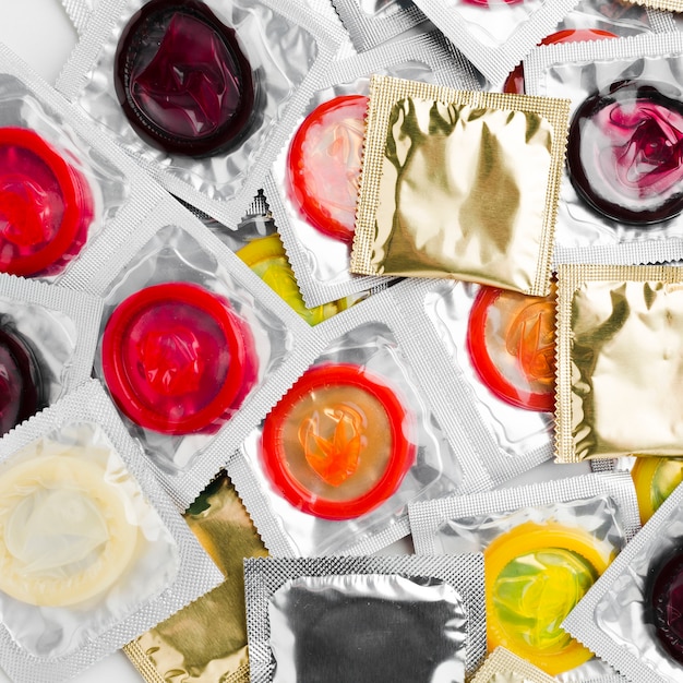 Top view packs of condoms arrangement