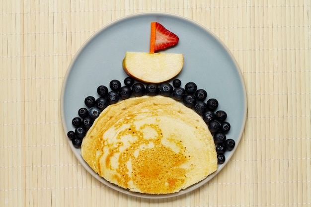 Top view pancake and blueberries