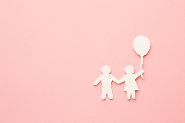 Top view paper cut children and balloon with copy space