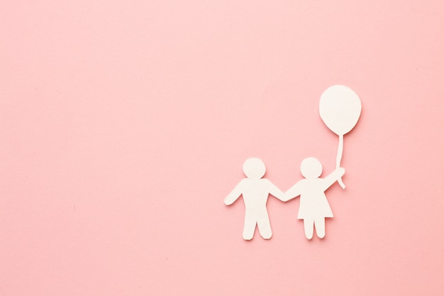 Top view paper cut children and balloon with copy space