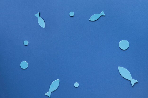 Top view of paper fish with circles