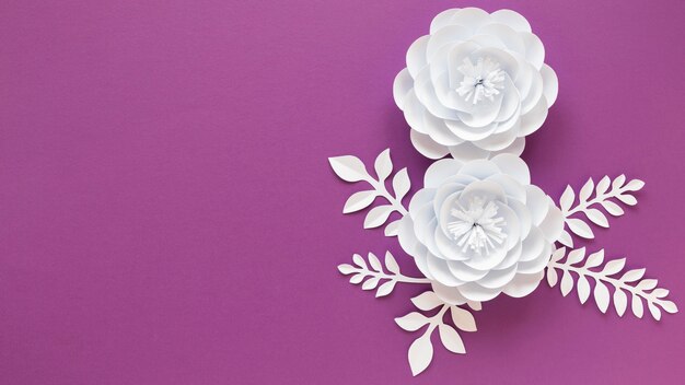 Top view of paper flowers for women's day with copy space